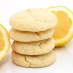 Freshly baked lemon sugar cookies dusted with powdered sugar