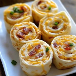 Bacon Cheddar Ranch Pinwheels sliced and served on a platter