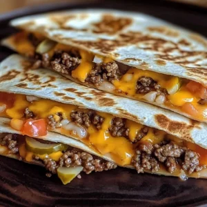 A crispy, golden quesadilla filled with juicy cheeseburger meat, melted cheese, and fresh toppings.