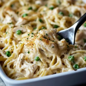 Easy Chicken Tetrazzini served in a baking dish with a golden top
