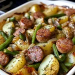Sausage Green Bean Potato Casserole served in a baking dish