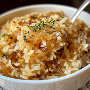 A bowl of Savory French Onion Soup Rice garnished with melted cheese