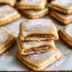 A batch of Brown Sugar Pop Tart Cookies drizzled with cinnamon glaze