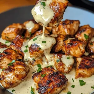 Grilled Chicken Bites with Garlic Sauce served on a plate