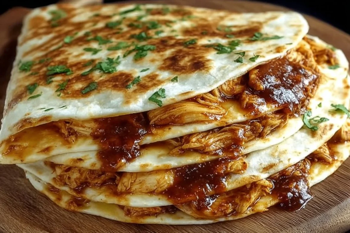 Delicious BBQ chicken quesadillas on a plate with melted cheese