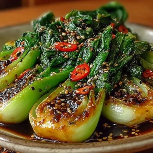 Bok Choy with Ginger Chili Sauce served in a bowl