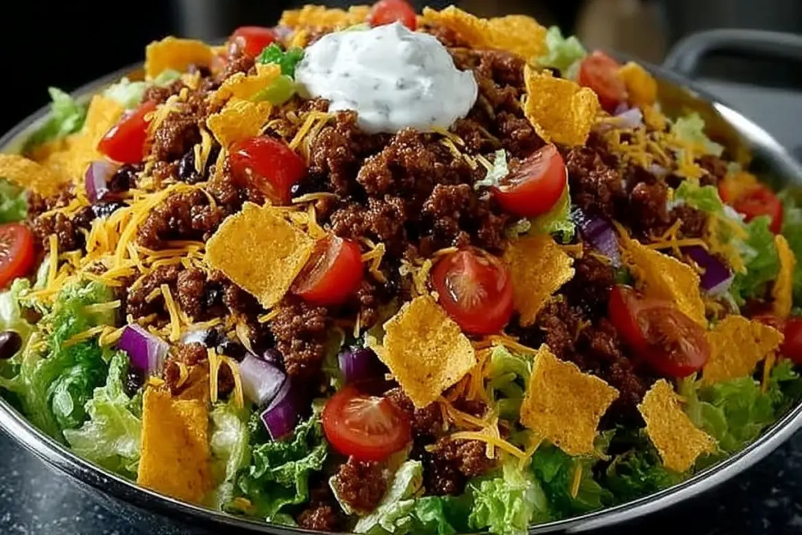 Delicious Dorito Taco Salad with colorful toppings and crunchy Doritos