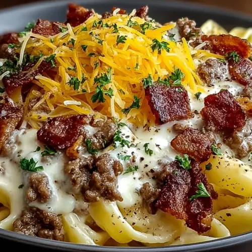 Creamy Loaded Bacon Cheeseburger Alfredo Pasta in a bowl
