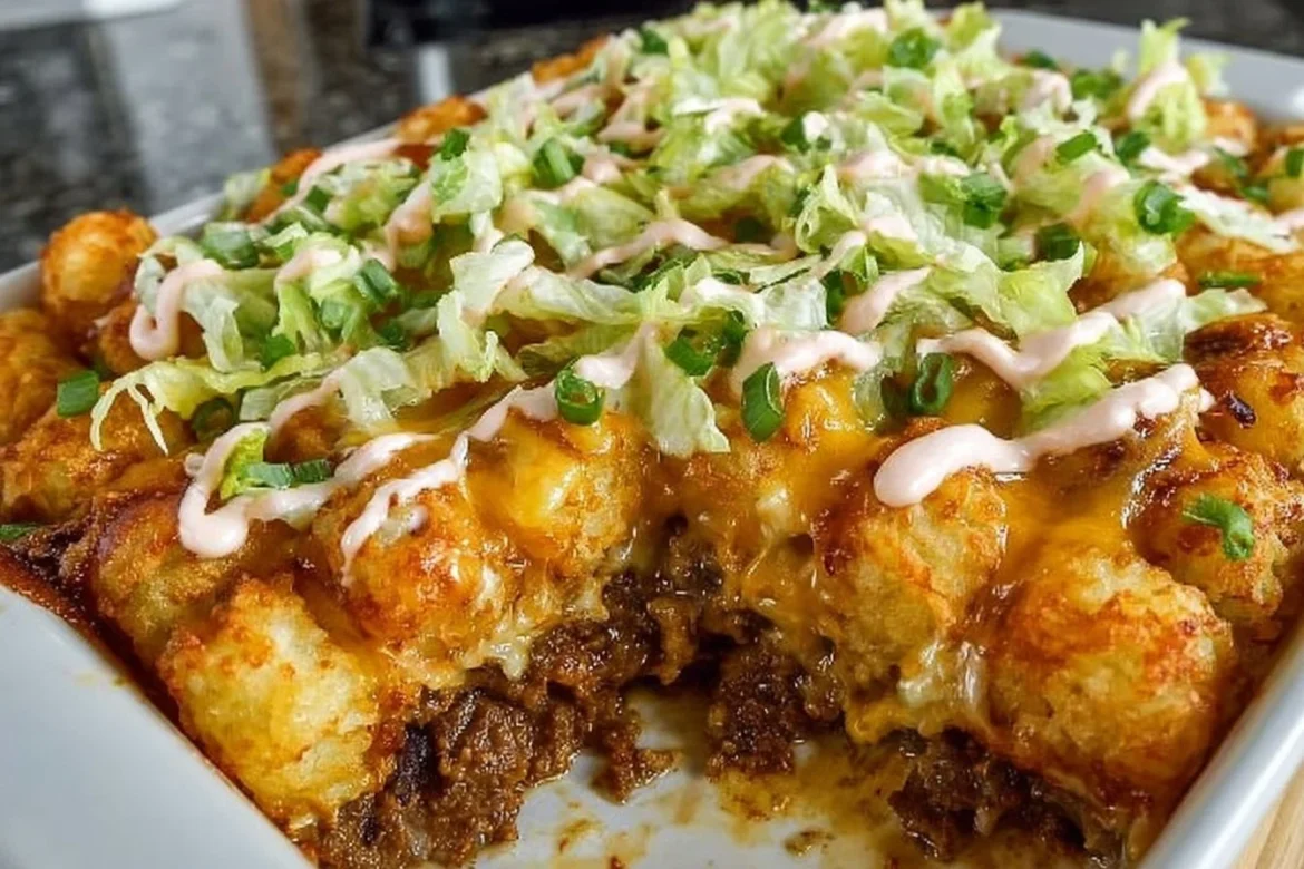 Big Mac Tater Tot Casserole topped with cheese and served in a baking dish