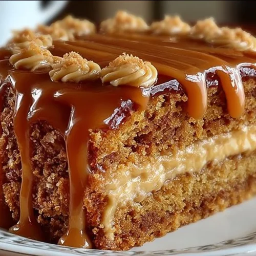 Delicious homemade butterscotch cake with caramel frosting on a plate