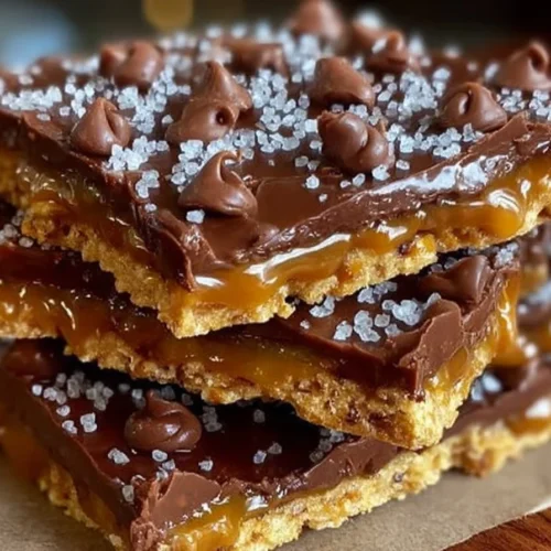 Delicious homemade caramel chocolate crunch bars stacked on a plate