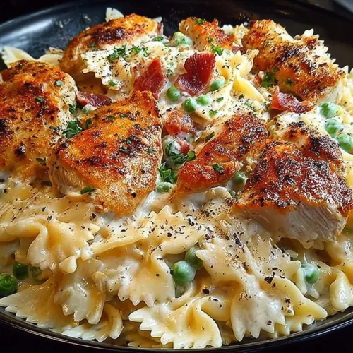 Delicious Chicken Carbonara served with cheese and parsley