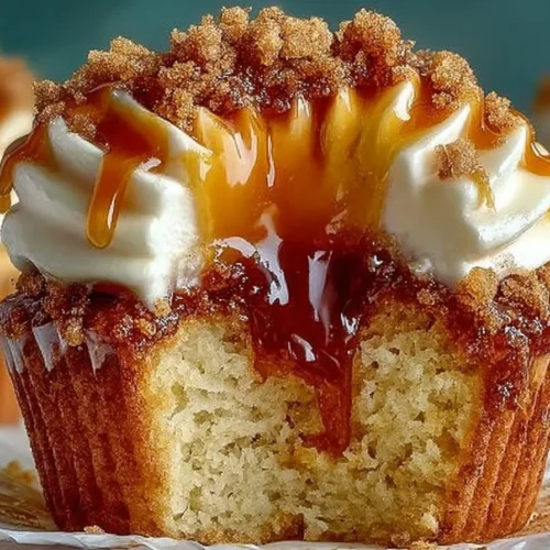 Delicious Churro Caramel Crunch Cupcakes topped with caramel