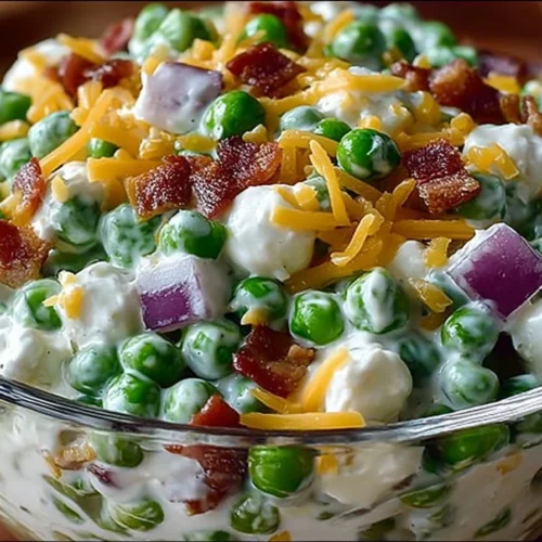 Fresh and colorful Classic Pea Salad with vegetables and dressing