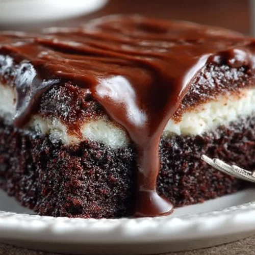 A delicious homemade Ding Dong Cake with chocolate layers and cream filling