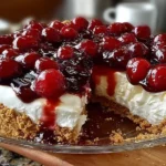 Easiest no-bake cherry cheesecake topped with fresh cherry filling