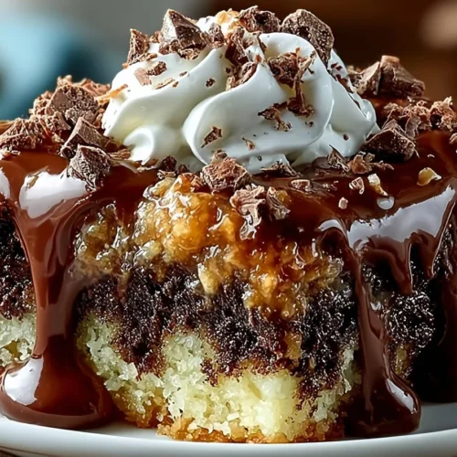 Irresistible German Chocolate Poke Cake topped with coconut and pecan frosting