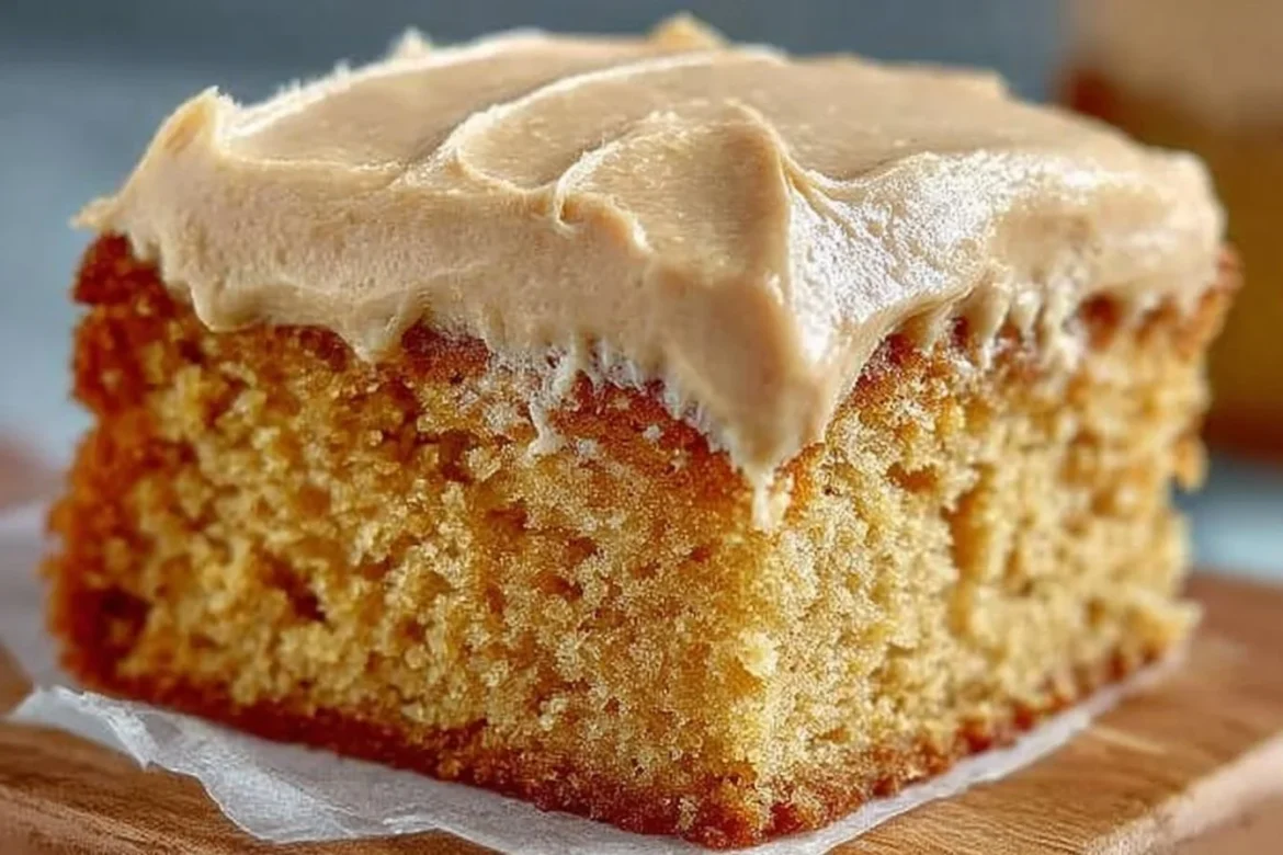 Delicious peanut butter sheet cake topped with creamy frosting