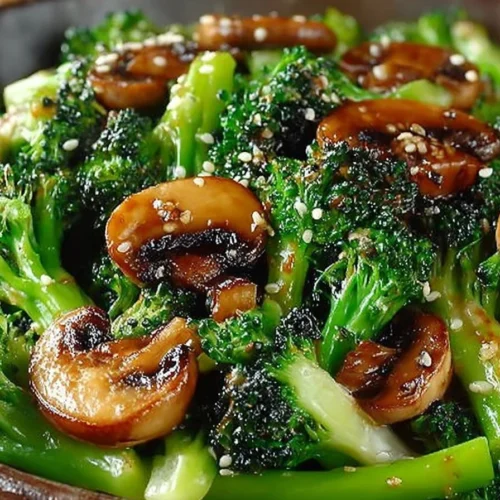 Quick and tasty broccoli mushroom stir-fry plated with vibrant vegetables.