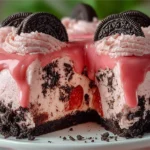 Delicious Strawberry Cake topped with Oreo Crumble and Cookies 'n Cream Icing