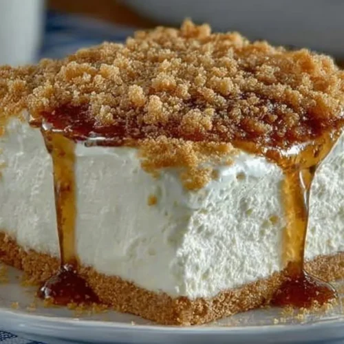 Delicious Woolworth Ice Box Cheesecake served on a plate with strawberries