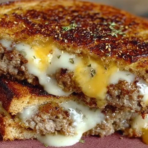 Ultimate patty melt sandwich topped with secret sauce and melted cheese