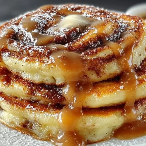 Delicious brown sugar and cinnamon swirl pancakes stacked on a plate