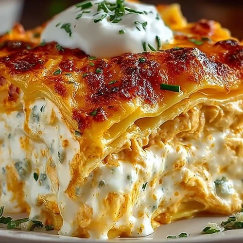 Delicious Buffalo Chicken Lasagna with ranch dressing and cheesy layers.