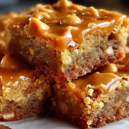 Delicious butterscotch toffee cookie bars on a white plate