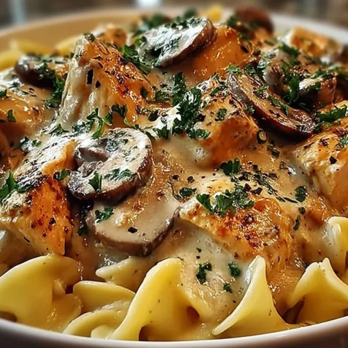 Creamy Chicken Mushroom Stroganoff served in a bowl with pasta