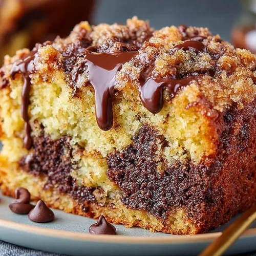 Delicious chocolate chip coffee cake served on a plate