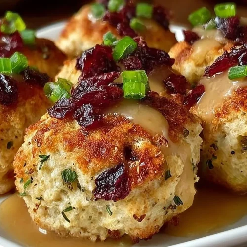 Cranberry turkey stuffing balls on a festive table, a perfect holiday dish.