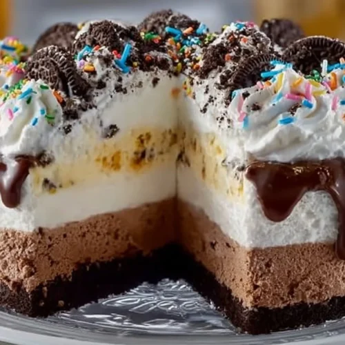 Delicious Dairy Queen ice cream cake decorated with chocolate and vanilla layers.