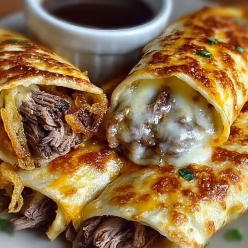 French Dip Tortilla Roll Ups with au jus dipping sauce