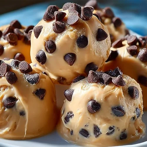 Frozen Greek yogurt peanut butter bites with chocolate chips in a bowl