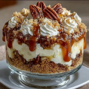 Delicious pecan pie cheesecake trifle served in a glass dish