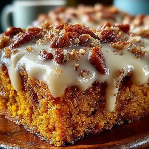 Sweet Potato Honey Bun Cake topped with Pecans, a delicious dessert option