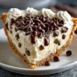 Delicious Cannoli Cream Pie with creamy filling and crispy crust, a no-bake dessert.