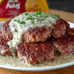 Succulent Crock Pot cube steak served with gravy and vegetables