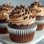 Fluffy chocolate mousse cupcakes topped with rich chocolate frosting
