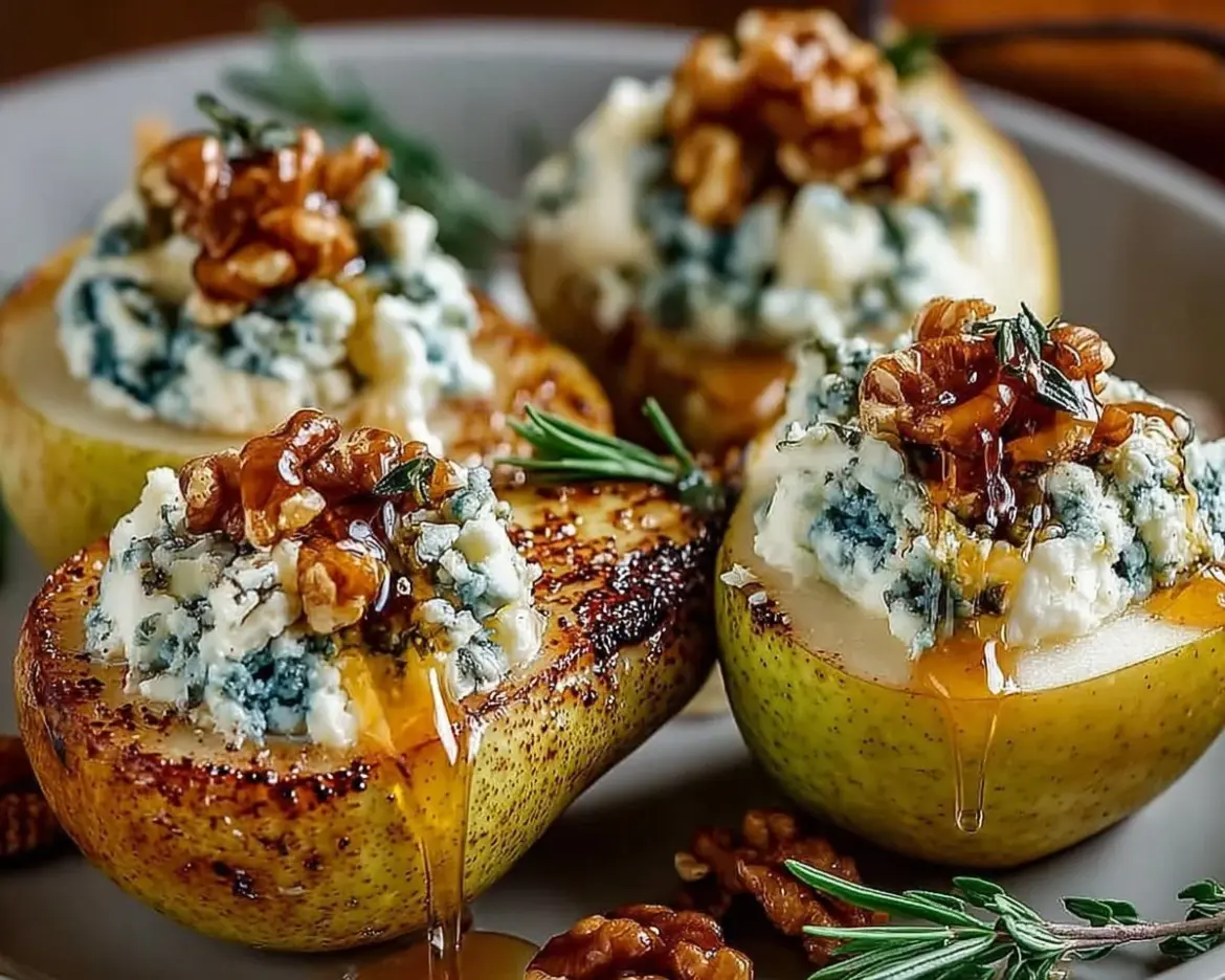 Blue cheese stuffed pears on a serving platter