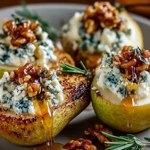 Blue cheese stuffed pears on a serving platter