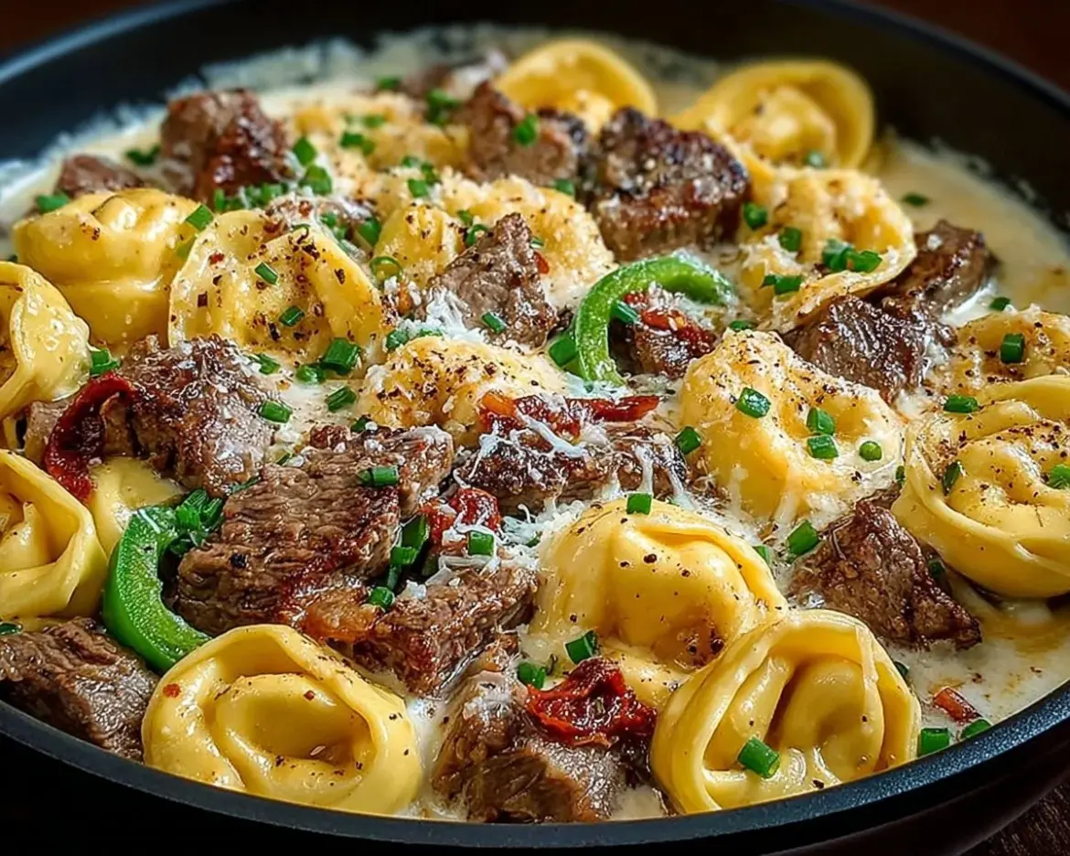 Delicious Cheesesteak Tortellini served with rich provolone sauce
