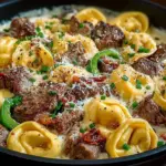 Delicious Cheesesteak Tortellini served with rich provolone sauce
