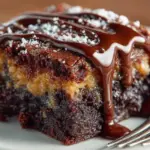 Decadent Chocolate Peanut Butter Ooey Gooey Cake with a rich chocolate layer